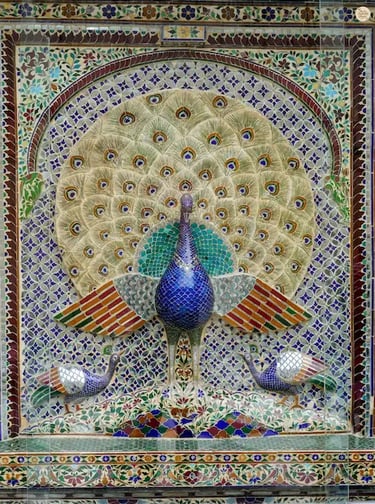 Intricate peacock design with mirrored tiles at Mor Chowk, City Palace Udaipur Rajasthan.