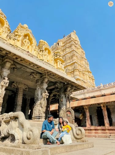 Family cherishing moments together at Virupaksha Temple in Hampi.