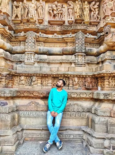 Close-up of intricate carvings on the outer wall of Lakshmana Temple, Khajuraho, Madhya Pradesh.