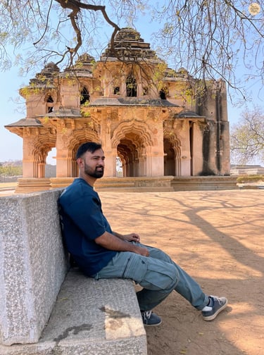 Sitting by Lotus Mahal—soaking in the royal silence of Hampi’s past.