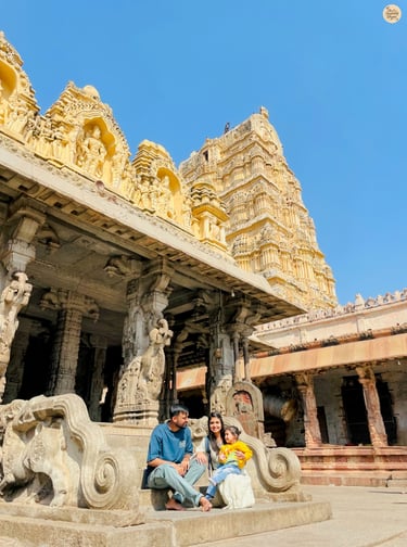 At Virupaksha Temple—cherishing family moments in the heart of Hampi.