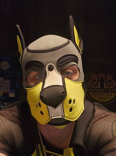 man in yellow pup mask