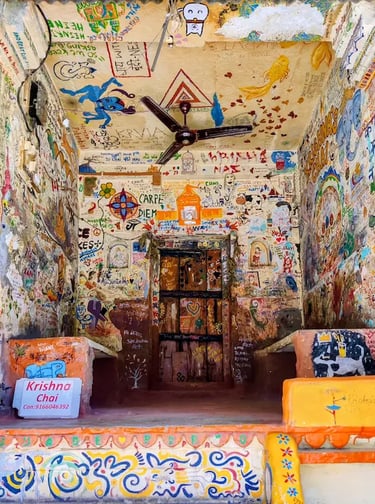 Artistic graffiti and travel doodles inside Krishna’s famous tea stall in Bundi, Rajasthan.