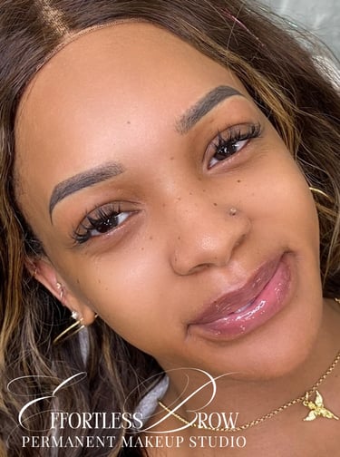 Stunning transformation with freshly done ombre powder brows, providing a full and polished look.