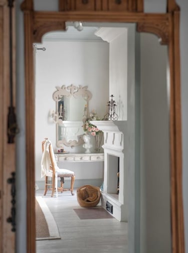 Master Suite at Finca Santa Katerina, showing antique furnitures and a fireplace
