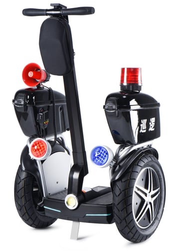 a black and white scooter with a police officer on it