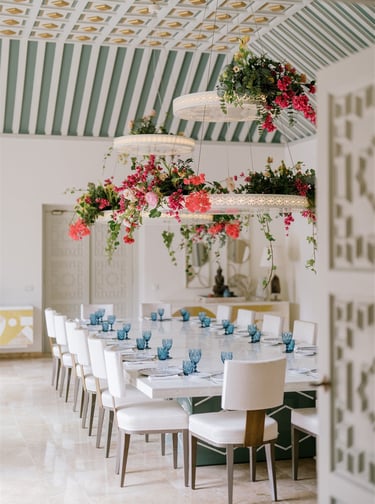 Villa El Rincon dining room with ornate ceilings and floral decor for a wedding