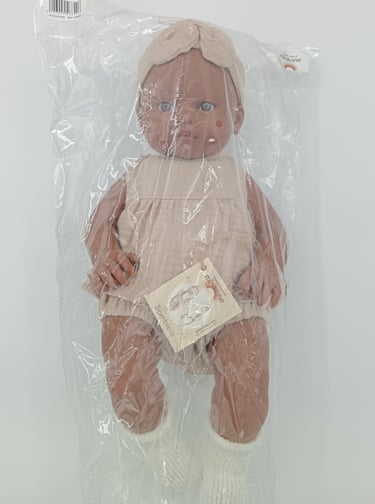 Minikane toddler doll in packaging