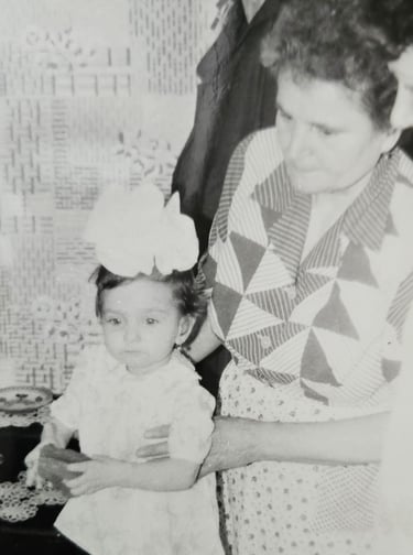 a woman holding a toddler 