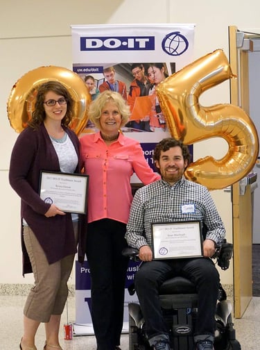 Sean with director of DO-IT and Krista Greerar, both holding a framed 2015 Trailblazer award