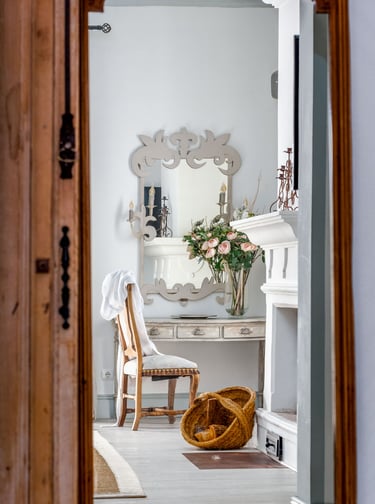 Master Suite at Finca Santa Katerina, showing antique furnitures and a fireplace