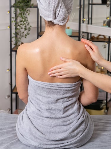 young woman getting back-massage