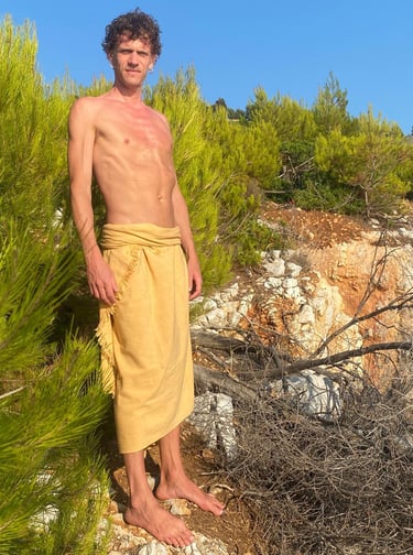 man wearing hemp sarong outdoors on travels