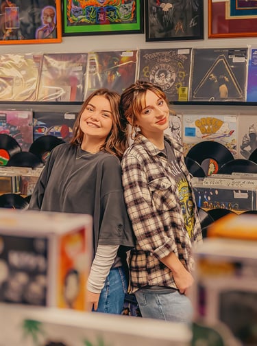 Senior pictures in a record store by Hershey PA senior picture photographer. Senior Rep Team Lancaster PA
