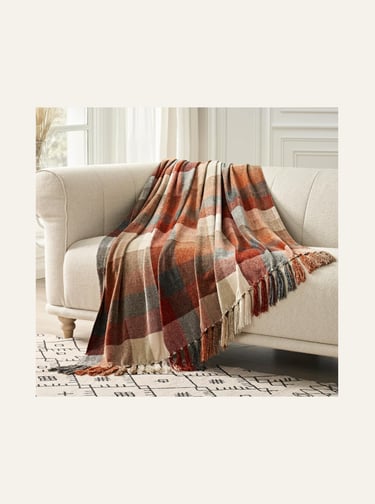 Picture of Plaid Chenille Throw Blanket on a couch