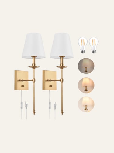 Set of two antique brass wall sconces with white fabric shades and dimmable LED bulbs for bedroom lighting.