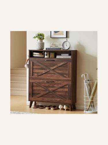 Rustic brown wooden shoe storage cabinet with X-pattern doors in a home entryway.