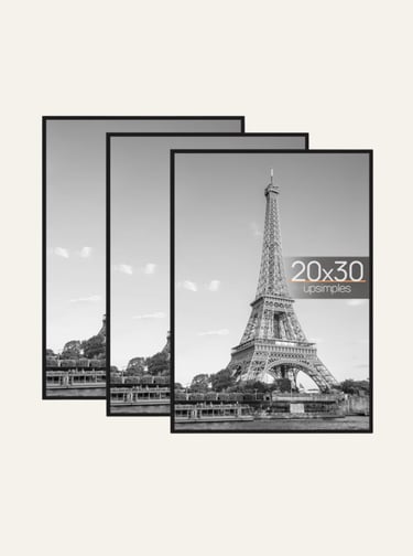 Set of three black 20x30 picture frames featuring black and white Eiffel Tower photography.