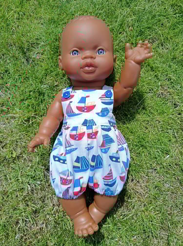 Minikane doll Kofi dressed in sailing boat overalls for summer