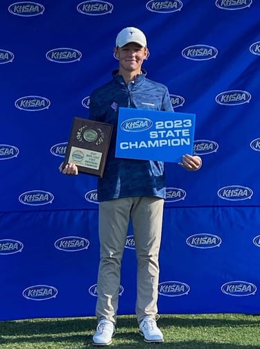 a man holding a plaque that says,'congratulations to the team