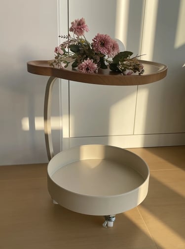 Lightweight small side table with flowers, designed for cozy balcony reading corners and compact out