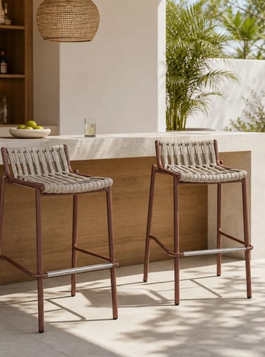 Small balcony seating area with woven outdoor chairs, natural light, and a relaxed setting for a coz