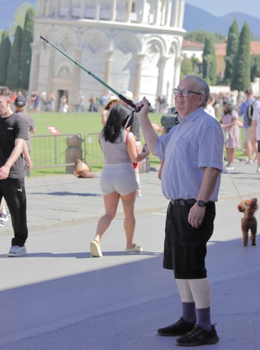 a man in a white shirt and black shorts