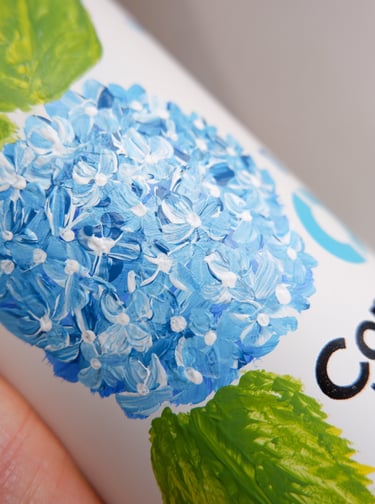 Hand painted tumbler with hydrangea flowers for an NYC event by Handwritten by Belle.