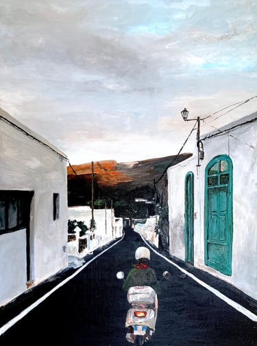 a woman riding scooter in Spanish village