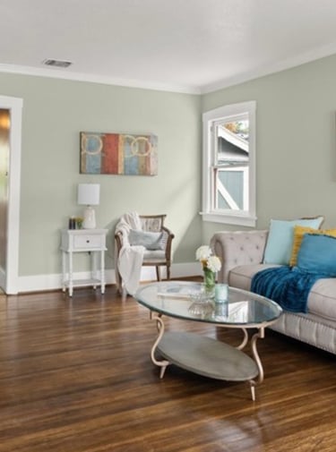 after luxury staging: a living room with a couch and a table