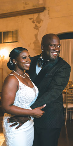 Louisiana wedding couple standing in front of a table