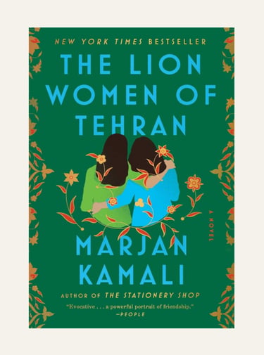 Book cover for The Lion Women of Tehran by Marjan Kamali featuring two women embracing amid floral patterns.