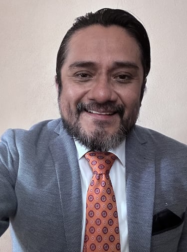 Professional psychologist smiling for a photo in formal attire