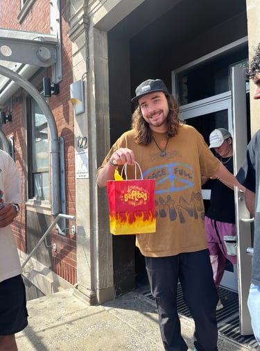 Man holding a gift bag