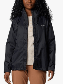 a woman in a black jacket and pants