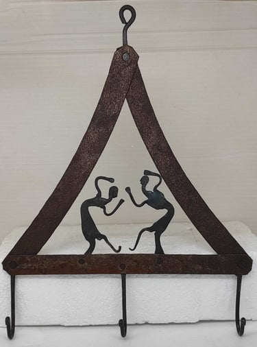 "Handcrafted iron wall-mounted key hanger with ethnic tribal style–front view-for global buyers"