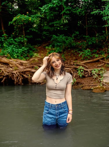 Palmyra PA senior pictures in creek by Lancaster PA senior picture photographer. Senior rep team