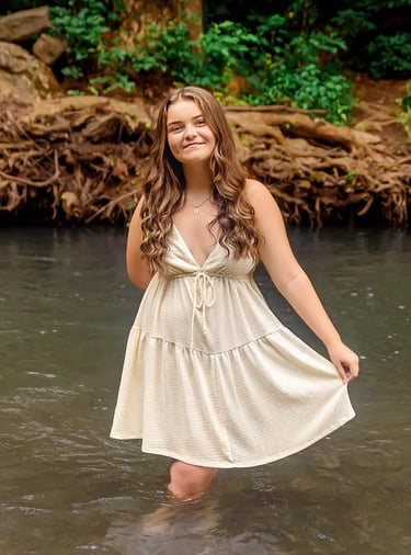 Palmyra PA senior pictures in creek by Lancaster PA senior picture photographer. Senior rep team