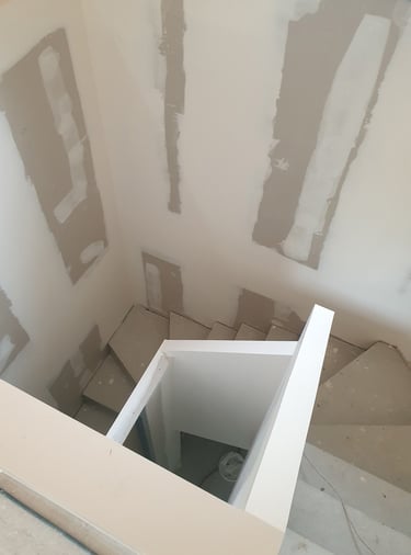 Pose de Placo dans une cage d'escalier