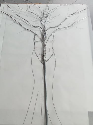 Structure de Karya en fil d'aluminium posée sur le croquis de la sculpture