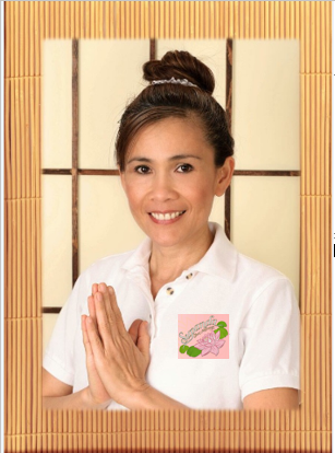 a woman in a white shirt and a pink flower