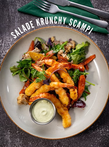 Salade Krunchy Scampi van Krunch Gent: frisse salade met krokante scampi en huisgemaakte dressing