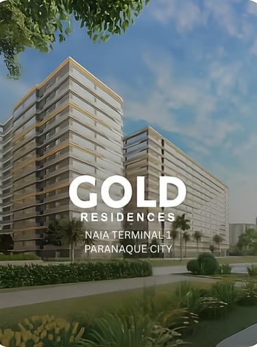 a building with a gold medal on the front and a blue sky in the background