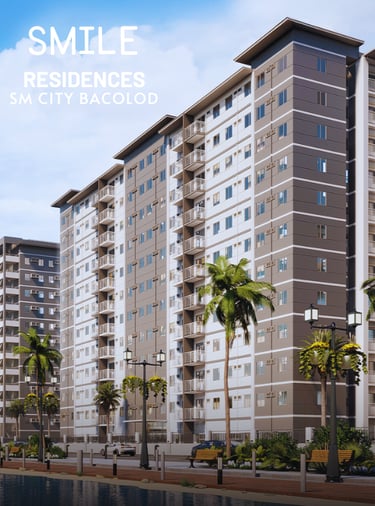a large apartment building with palm trees and a smile on the side