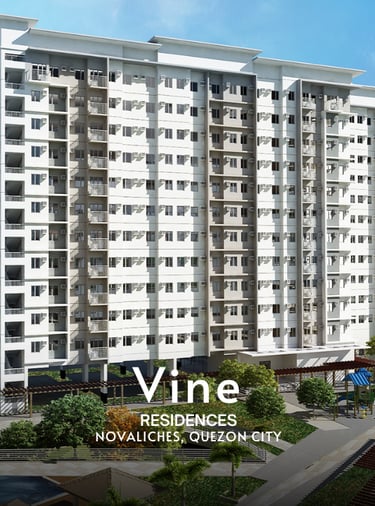 a large apartment building with a large white building in the background