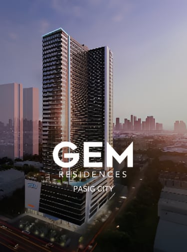a building with a large white sign that says gem residence