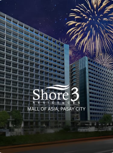 a large building with fireworks in the background