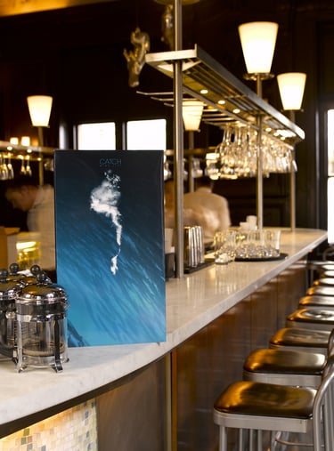 blue menu on marble surface in bar
