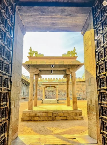 Grand temple gate of Sri Ranganathaswamy Temple leading to the open courtyard in Srirangam, Tamil Nadu.
