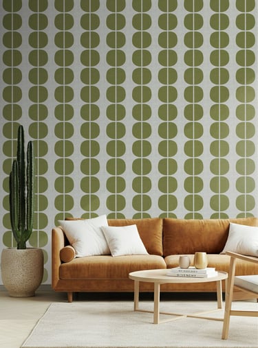 Olive green geometric wallpaper with bold half-circle motifs, styled in a modern living room